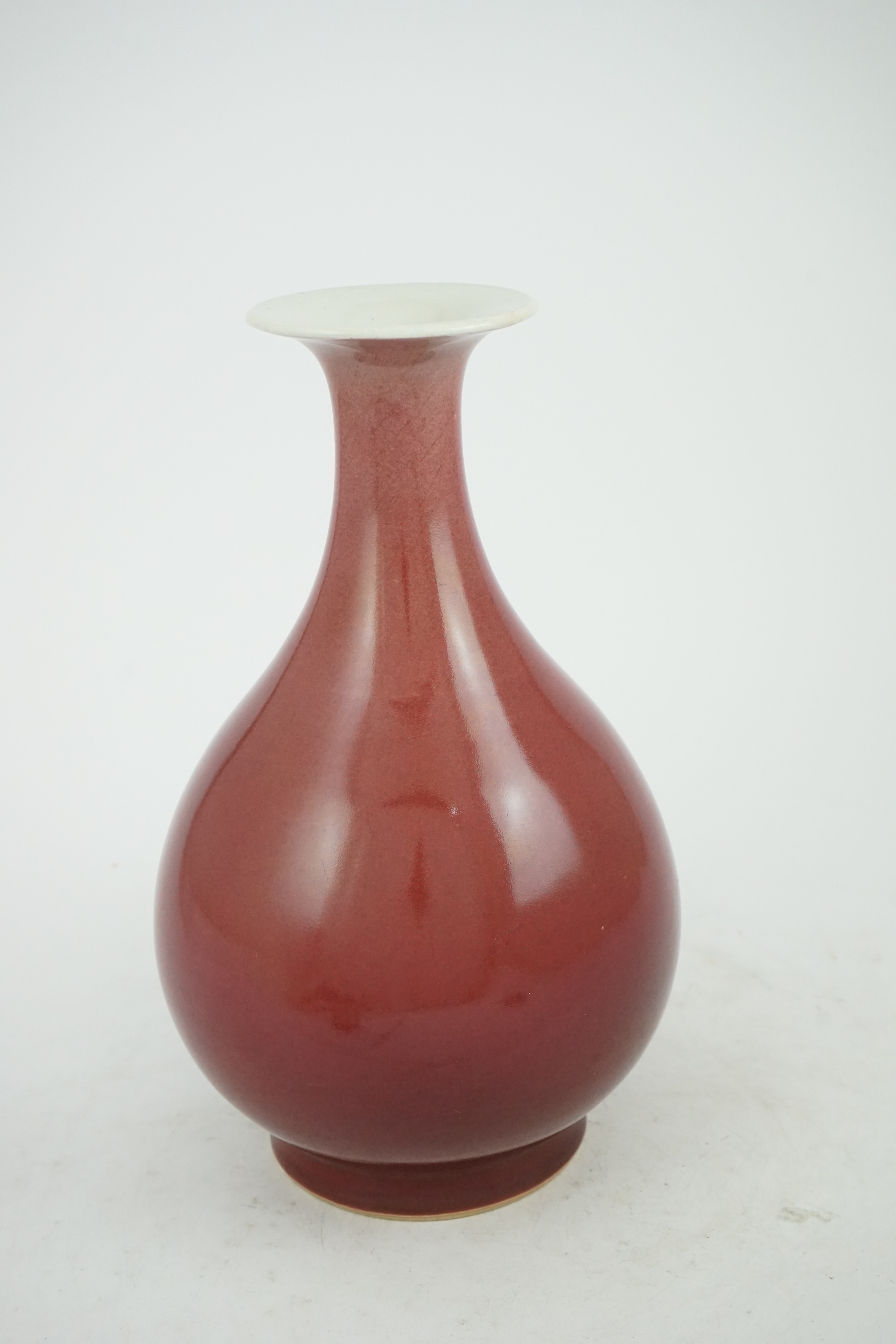 A Chinese sang-de-boeuf glazed pear shaped vase, yuhuchunping, 18th century